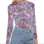 Purple floral long-sleeve top on a white background